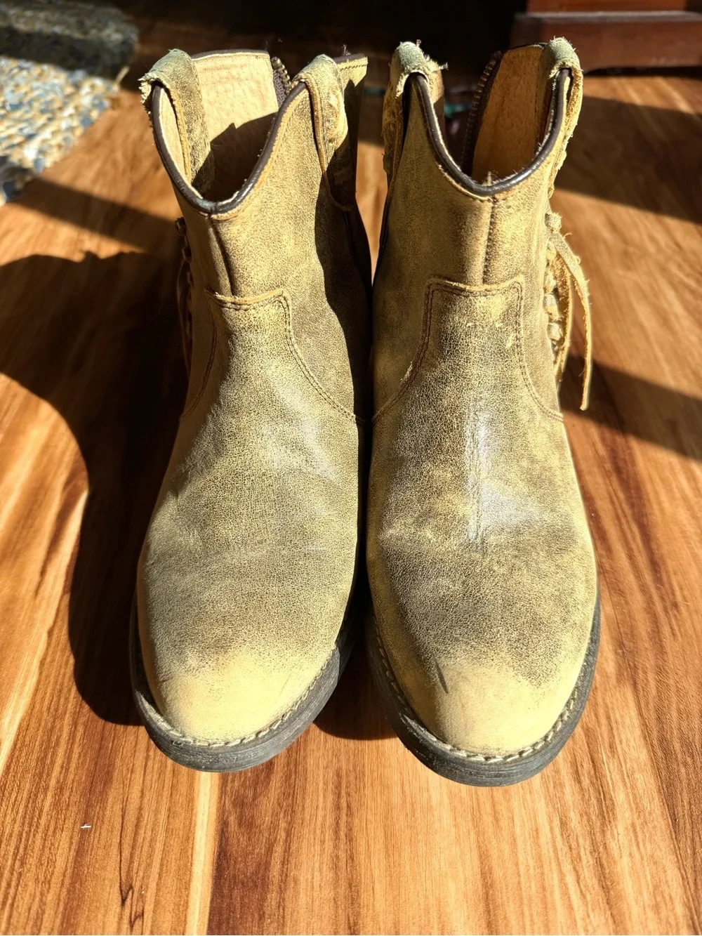 Very Volatile Genuine Leather Fringe Ankle Boots